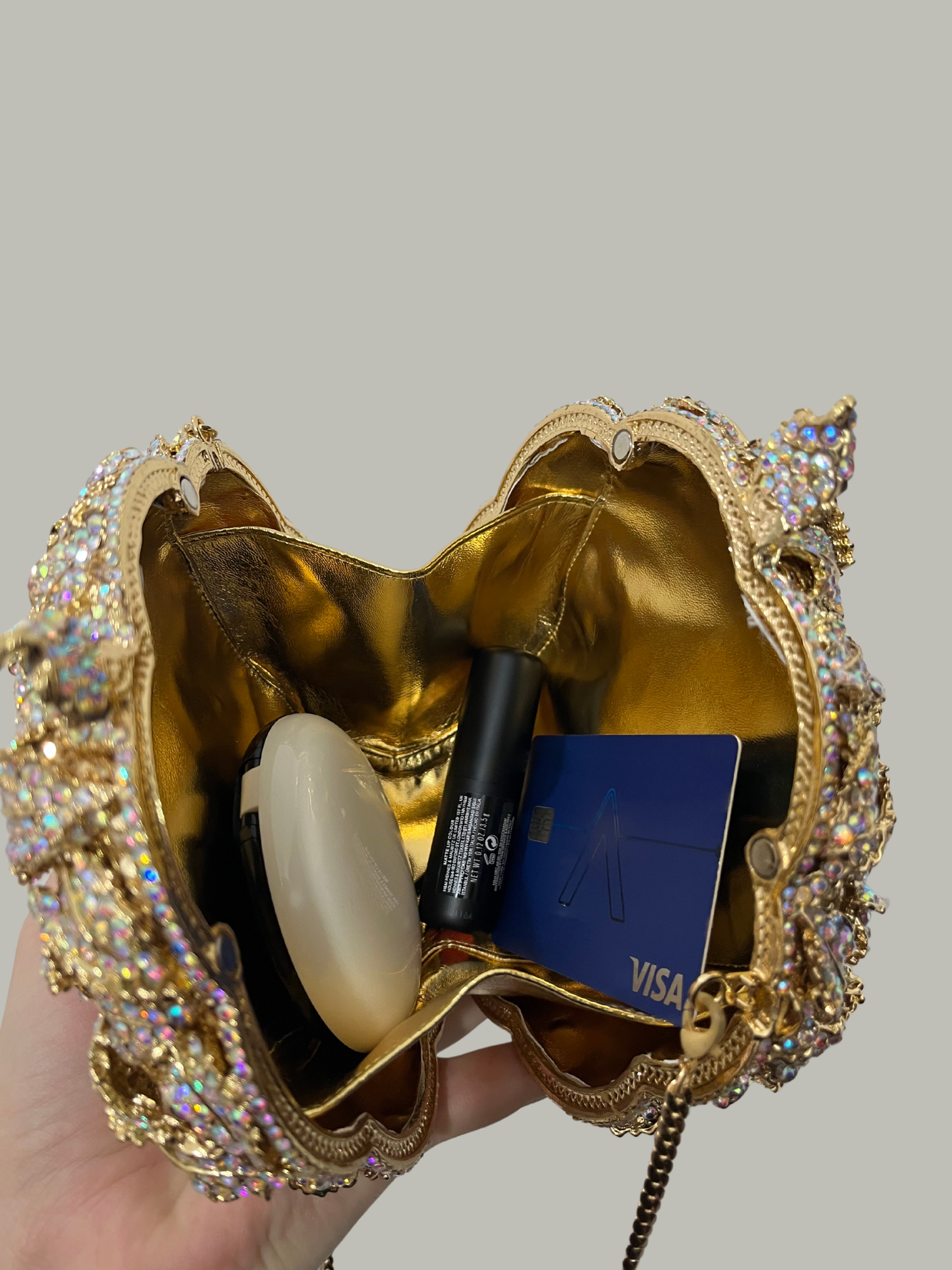 Bolso clutch rosa diamantes