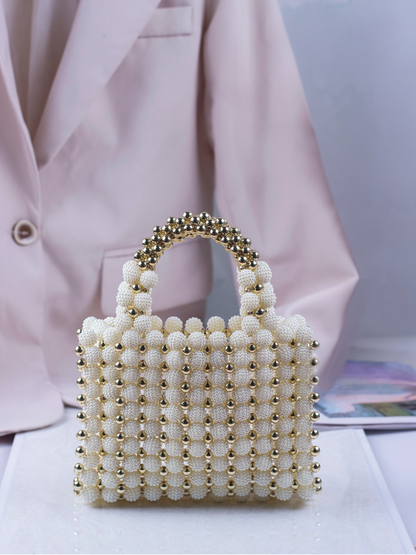 Bolso tejido perlas dorado