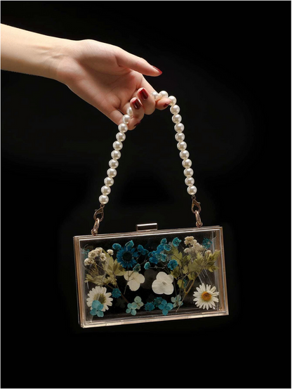 Bolso clutch flores preservadas