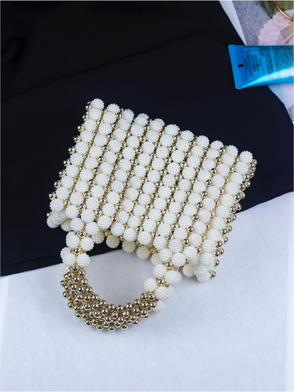 Bolso tejido perlas dorado