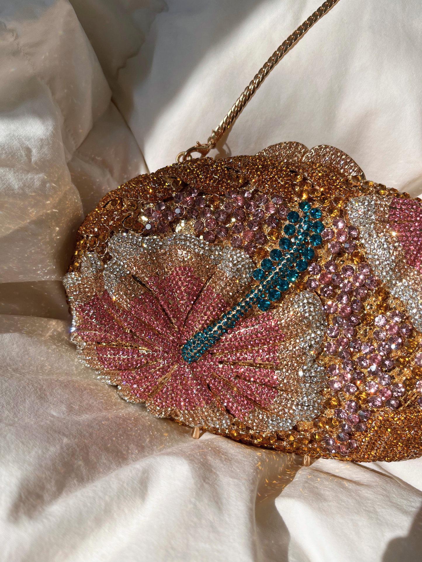 Bolso clutch diamantes flor