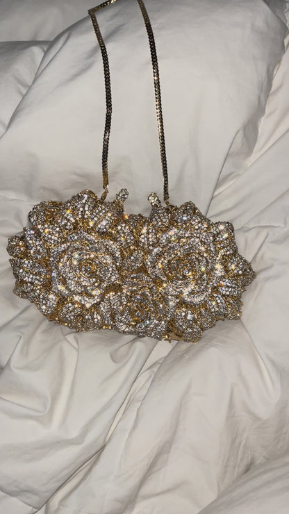 Bolso clutch rosas diamantes